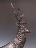 Two patinated Bronze stags after Jules Moigniez